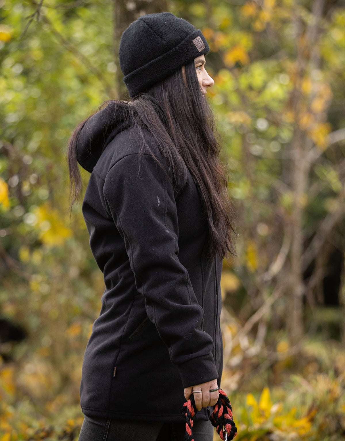Swazi Amur Women’s Windbreaker Jacket with detachable hood, windproof fabric, and contoured fit for outdoor comfort.