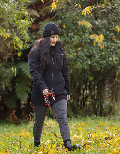 Swazi Amur Women’s Windbreaker Jacket with detachable hood, windproof fabric, and contoured fit for outdoor comfort.