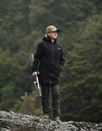 Swazi Amur Women’s Windbreaker Jacket with detachable hood, windproof fabric, and contoured fit for outdoor comfort.