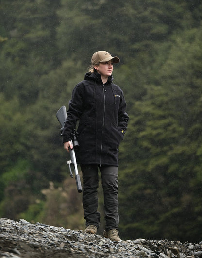 Swazi Amur Women’s Windbreaker Jacket with detachable hood, windproof fabric, and contoured fit for outdoor comfort.