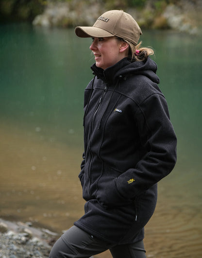 Swazi Amur Women’s Windbreaker Jacket with detachable hood, windproof fabric, and contoured fit for outdoor comfort.