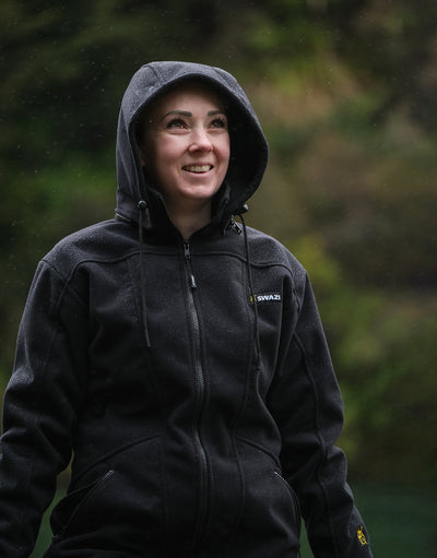 Swazi Amur Women’s Windbreaker Jacket with detachable hood, windproof fabric, and contoured fit for outdoor comfort.