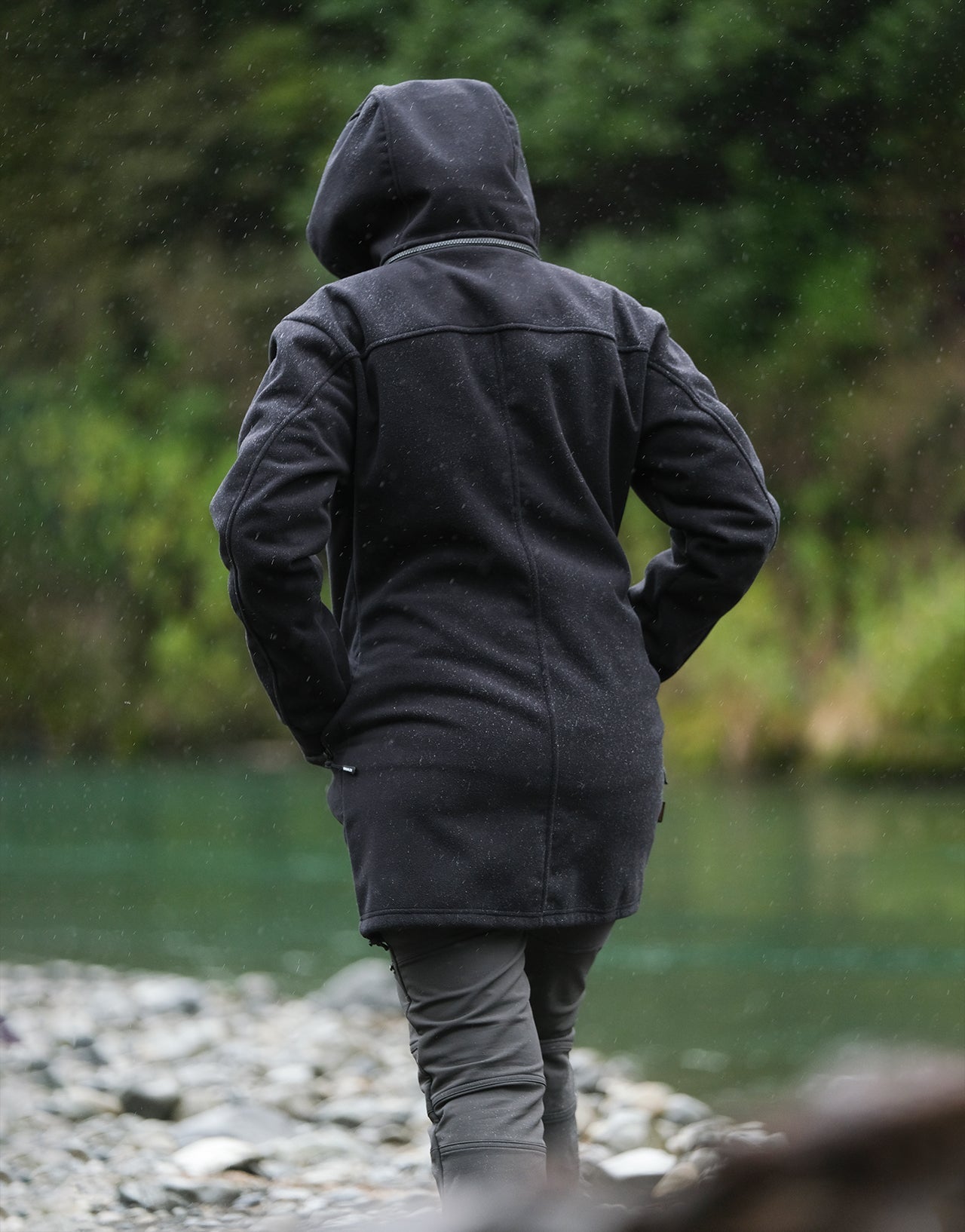 Swazi Amur Women’s Windbreaker Jacket with detachable hood, windproof fabric, and contoured fit for outdoor comfort.