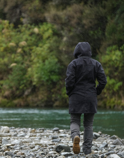 Swazi Amur Women’s Windbreaker Jacket with detachable hood, windproof fabric, and contoured fit for outdoor comfort.