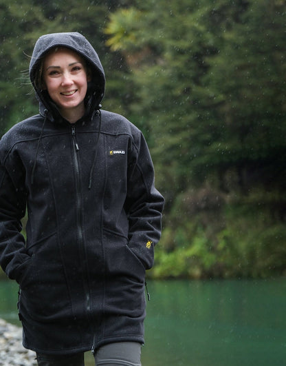 Swazi Amur Women’s Windbreaker Jacket with detachable hood, windproof fabric, and contoured fit for outdoor comfort.